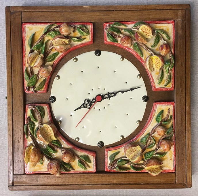 Orologio con Melograno